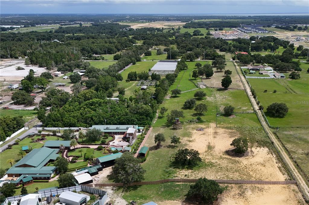 0 Ondich Road Apopka, FL 32712 - Photo 8 of 12 an aerial view of multiple houses with yard