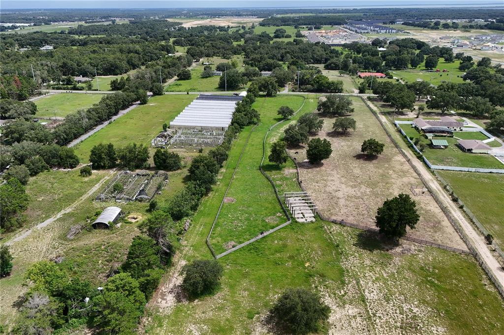 0 Ondich Road Apopka, FL 32712 - Photo 9 of 12 an aerial view of residential houses with outdoor space and street view