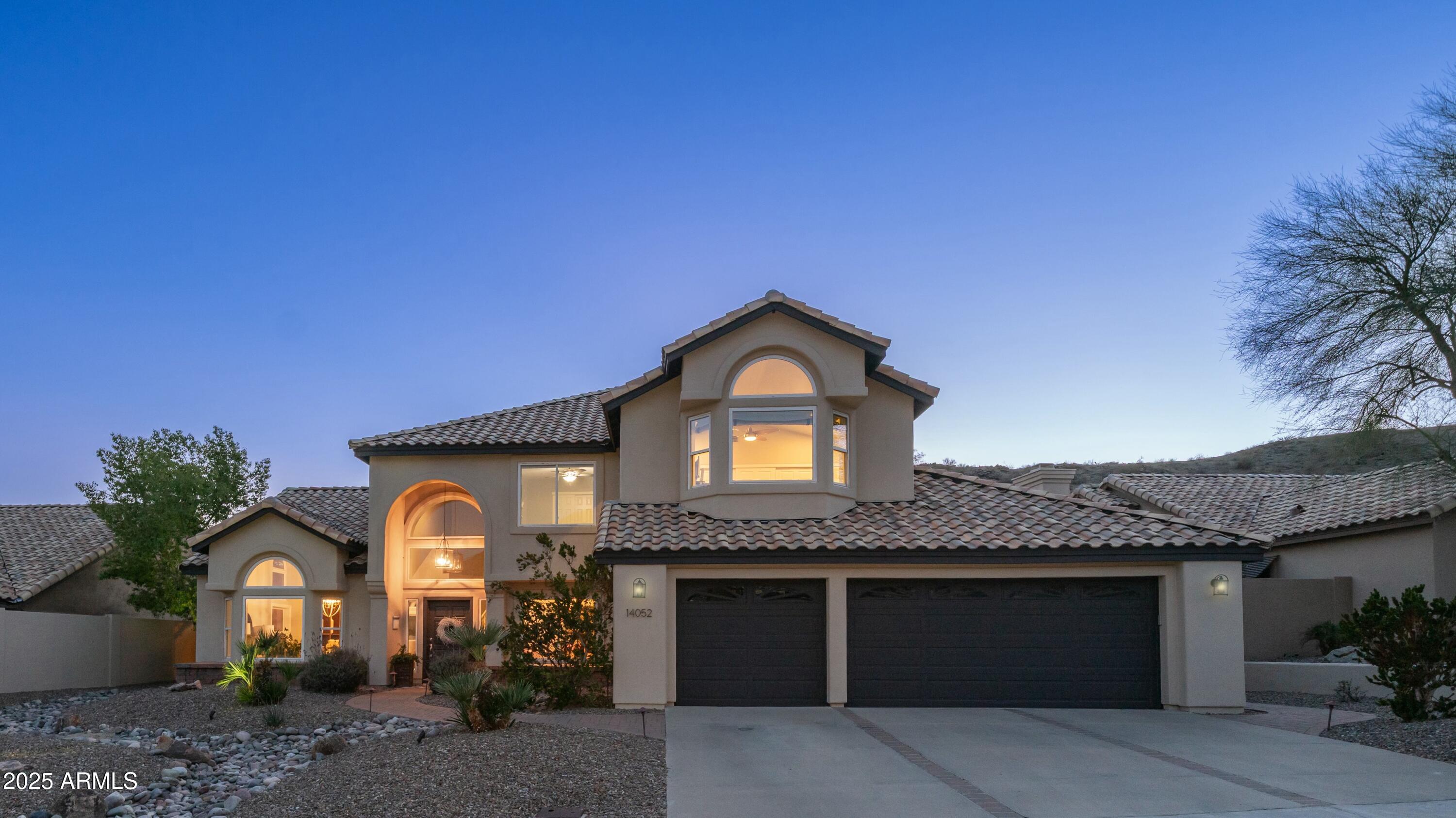 14052 South 24th Way Phoenix, AZ 85048 - Photo 3 of 70 Exterior at Twilight