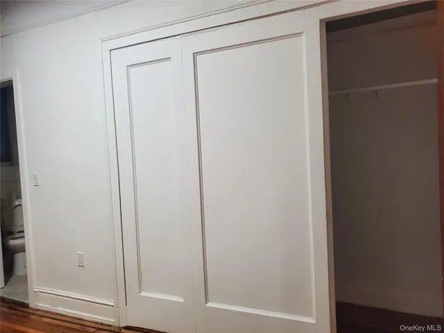 a bathroom with a sink a mirror and shower