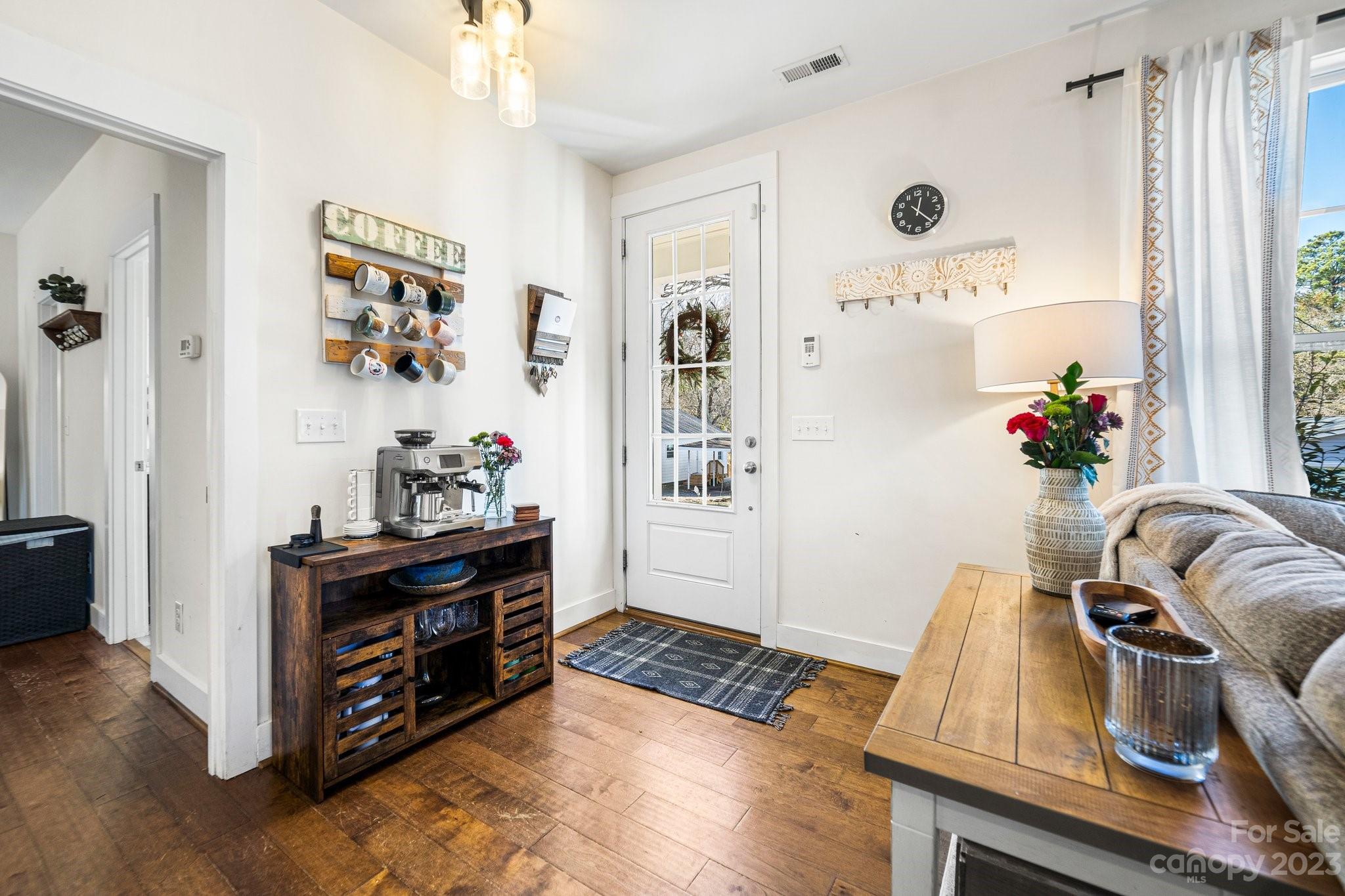 152 Mock Road Davidson, NC 28036 - Photo 13 of 29 a room with furniture and wooden floor