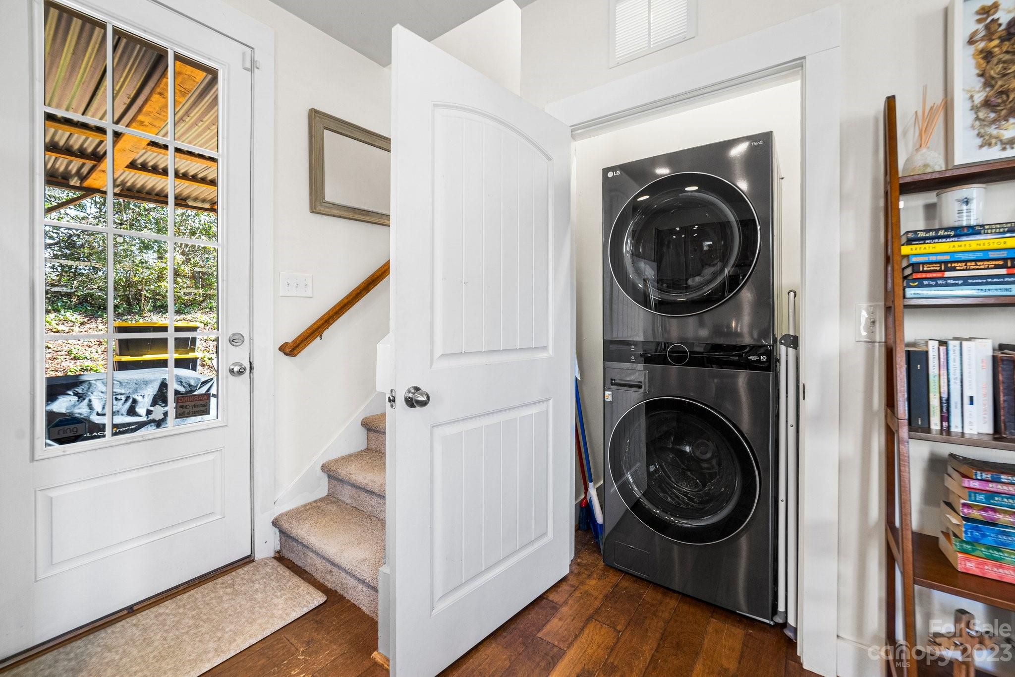 152 Mock Road Davidson, NC 28036 - Photo 18 of 29 a view of a hallway with washer and dryer