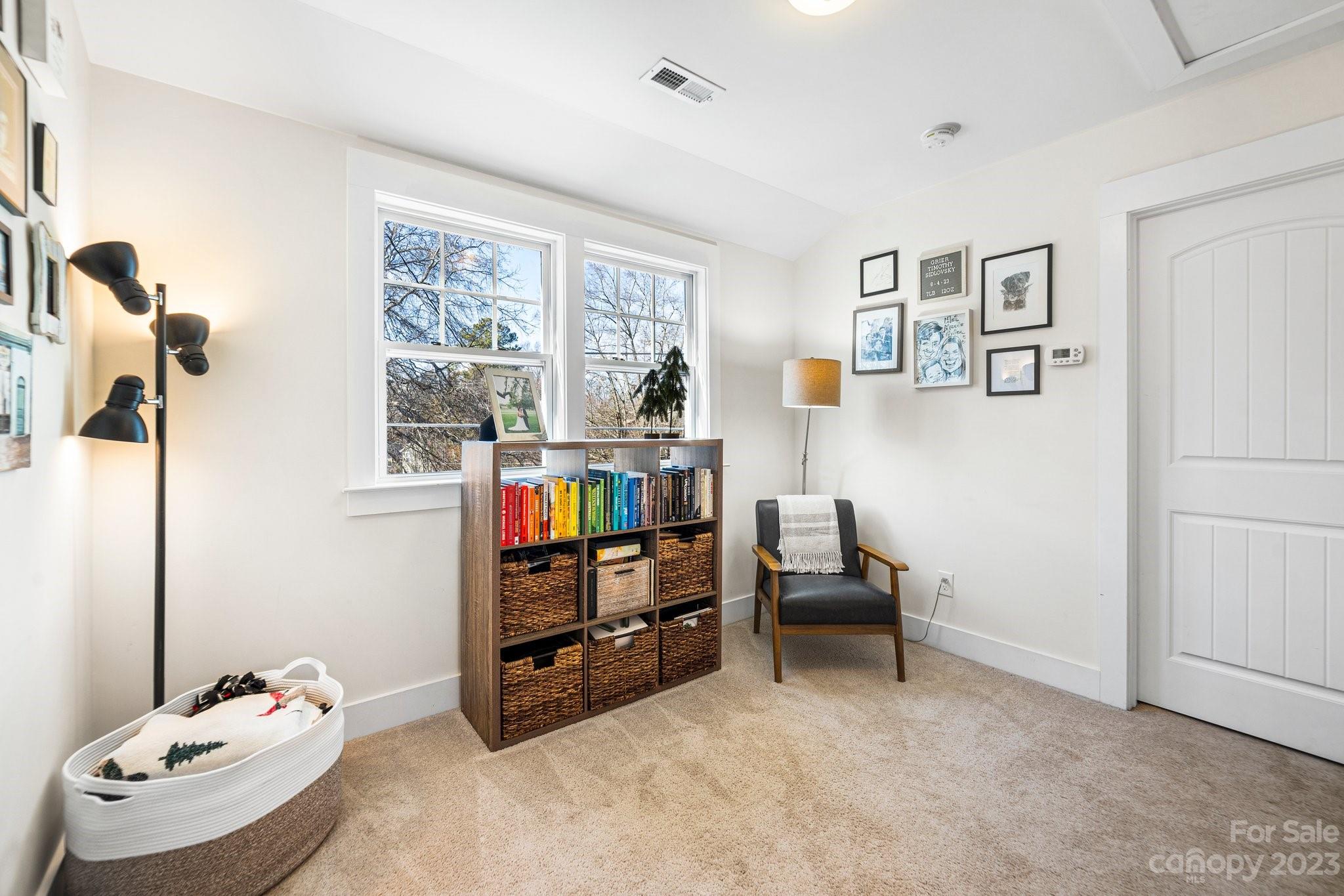 152 Mock Road Davidson, NC 28036 - Photo 20 of 29 a bedroom with furniture and a book shelf
