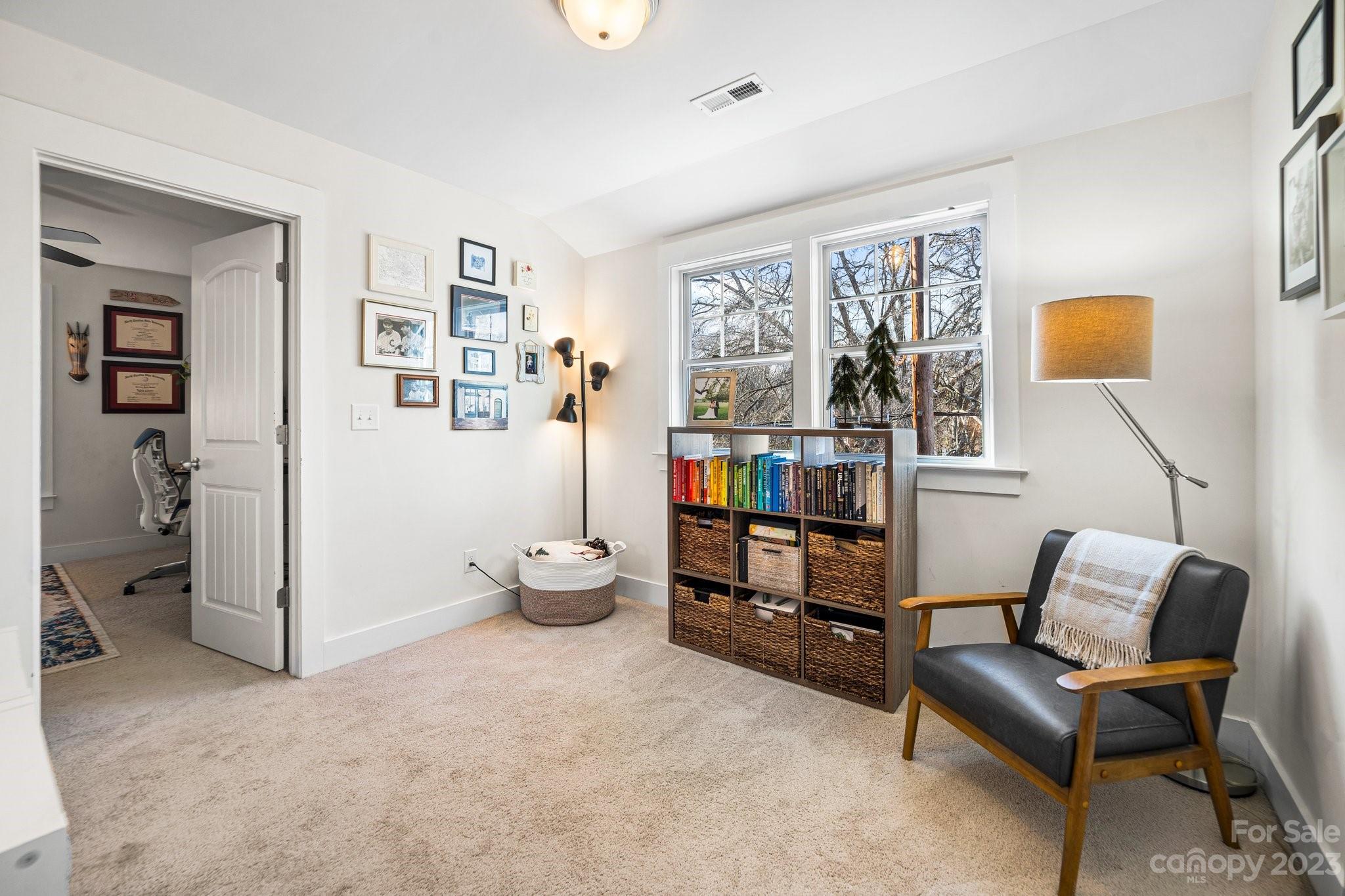 152 Mock Road Davidson, NC 28036 - Photo 22 of 29 a living room with furniture and a window