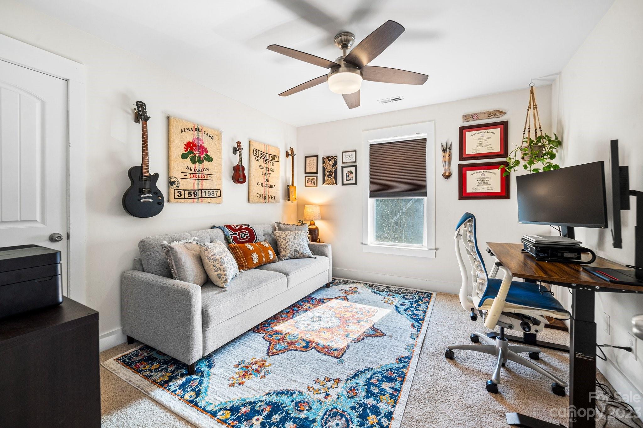 152 Mock Road Davidson, NC 28036 - Photo 24 of 29 a living room with furniture and a flat screen tv