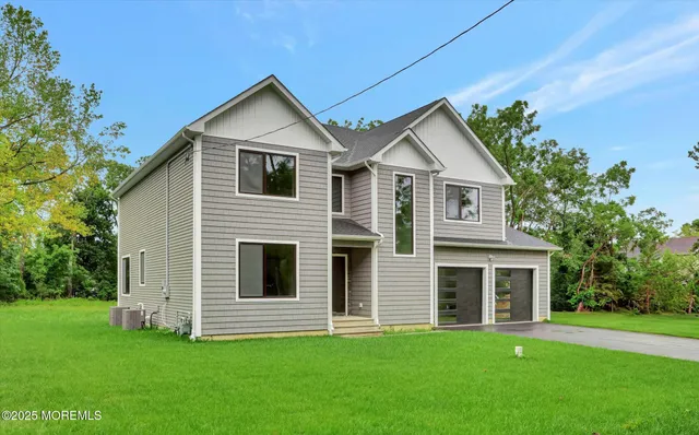 a house view with a garden space