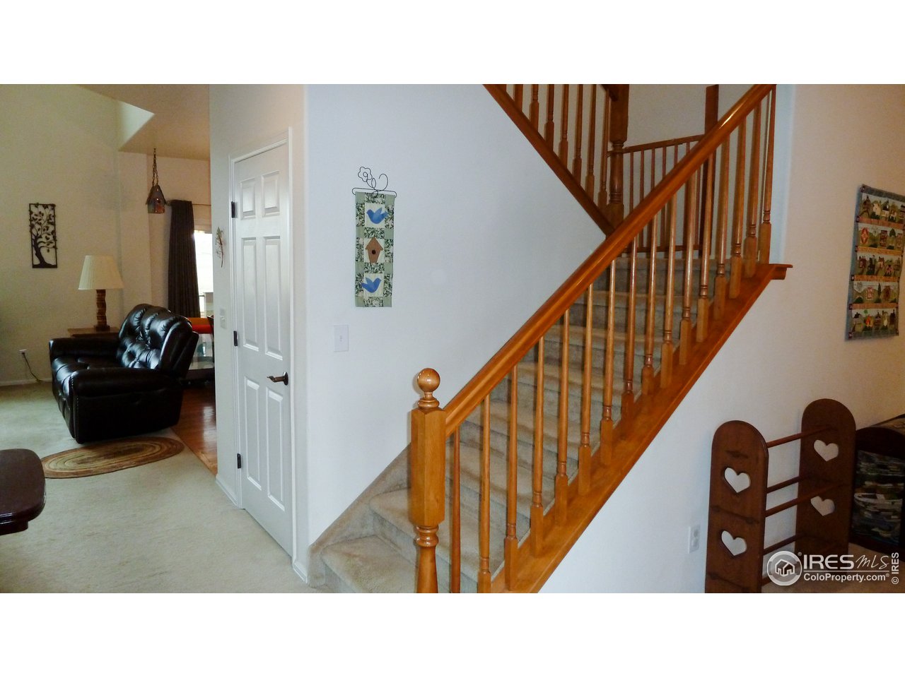 8121 Raspberry Drive Frederick, CO 80504 - Photo 17 of 38 a black and white photo of a living room