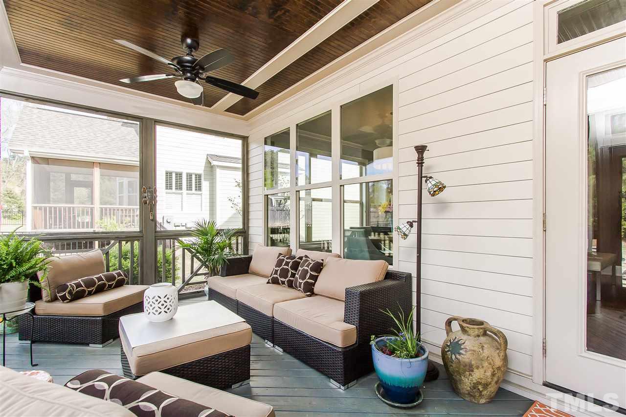 2804 Romealia Lane Raleigh, NC 27613 - Photo 2 of 25 a building outdoor space with patio furniture