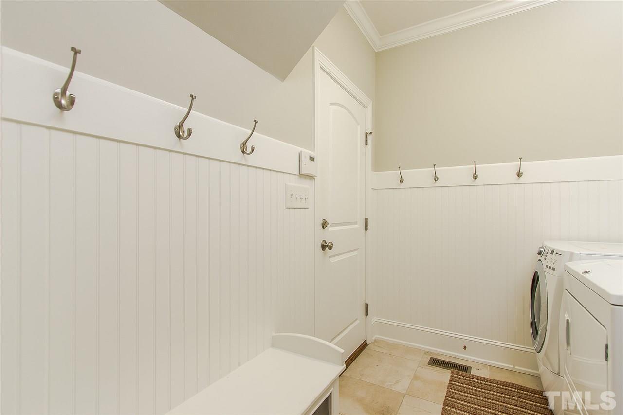 2804 Romealia Lane Raleigh, NC 27613 - Photo 15 of 25 a bathroom with a sink and vanity