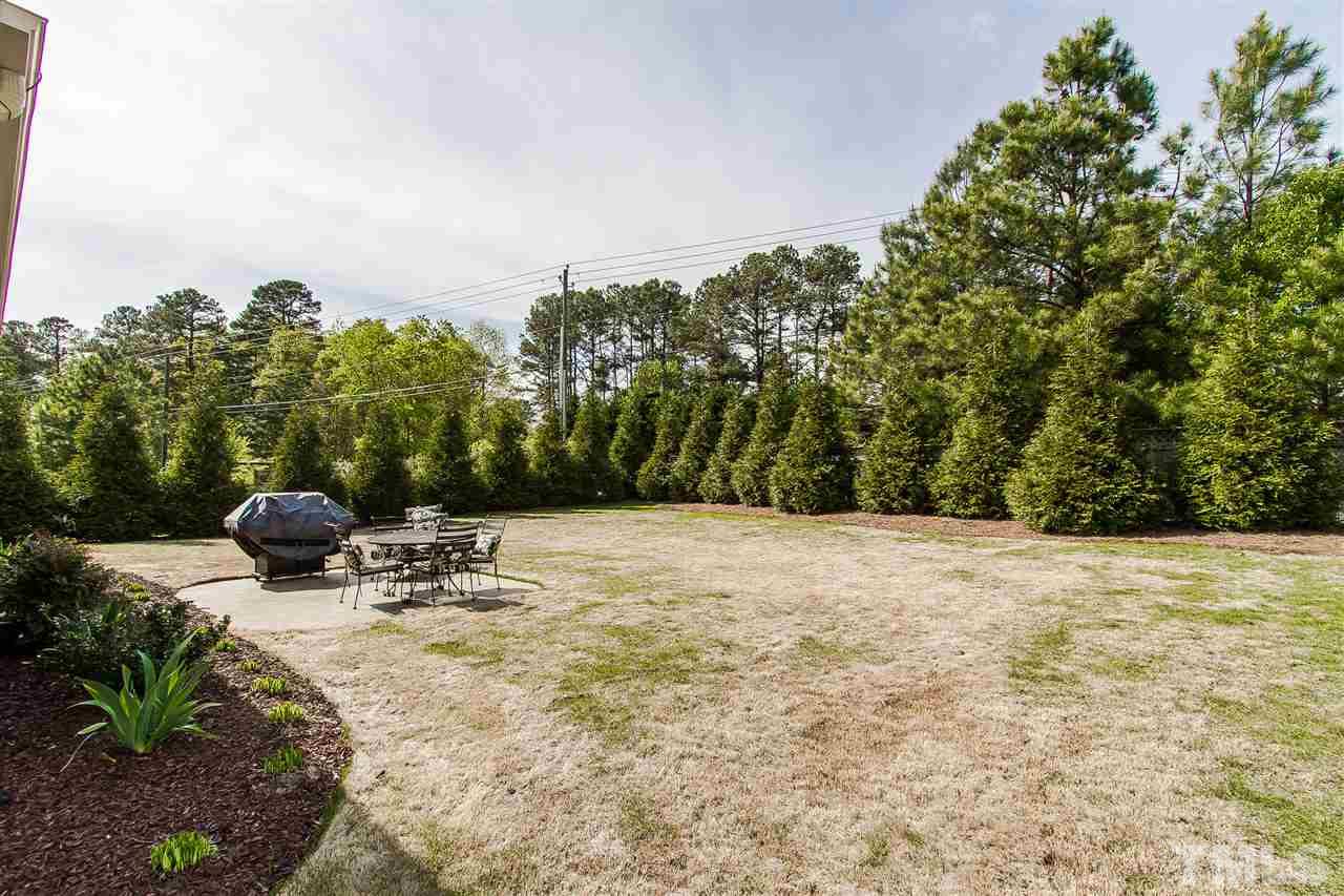 2804 Romealia Lane Raleigh, NC 27613 - Photo 25 of 25 a view of outdoor space with trees