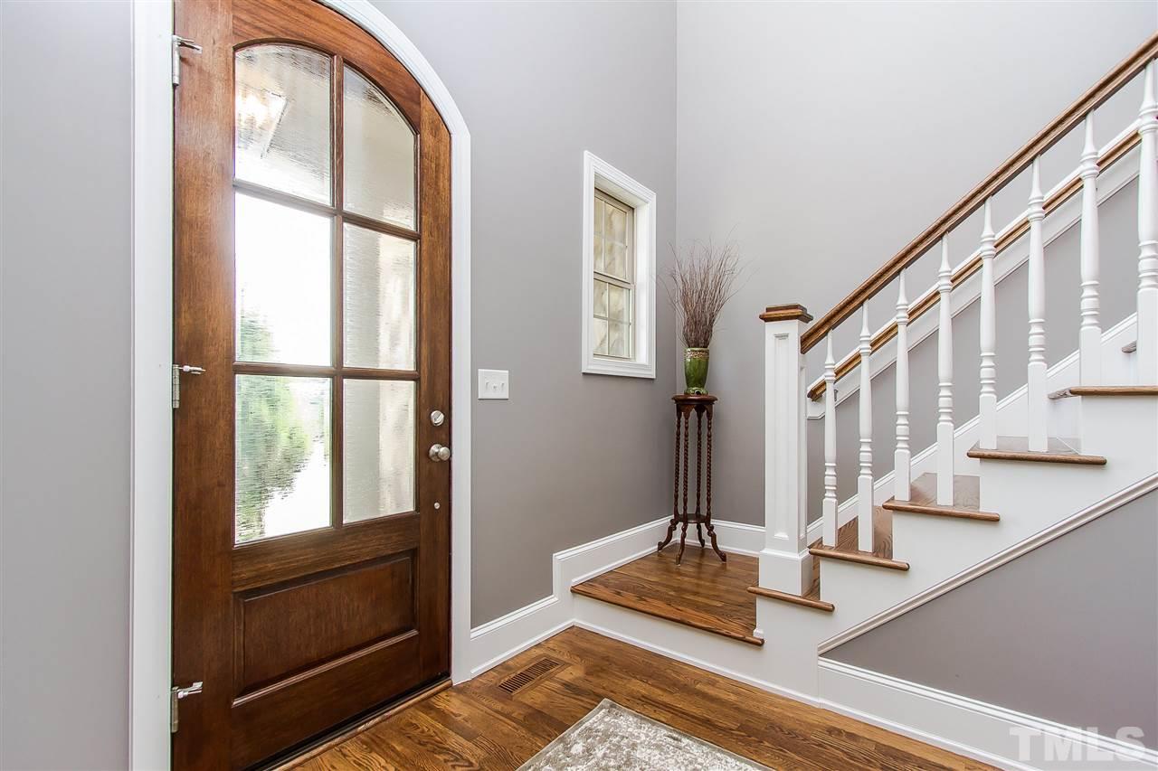 2804 Romealia Lane Raleigh, NC 27613 - Photo 4 of 25 a view of an entryway with staircase