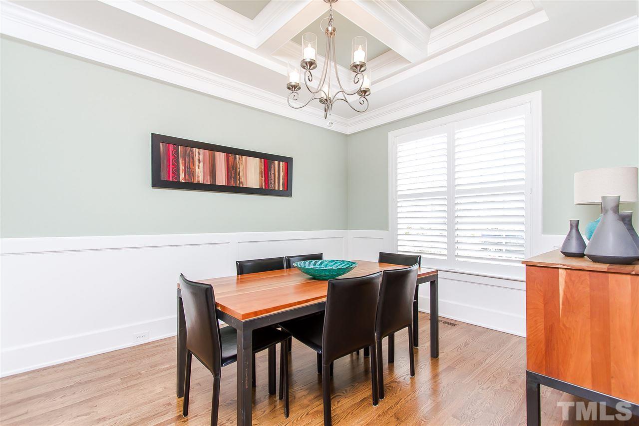 2804 Romealia Lane Raleigh, NC 27613 - Photo 5 of 25 a view of a dining room with furniture window and wooden floor