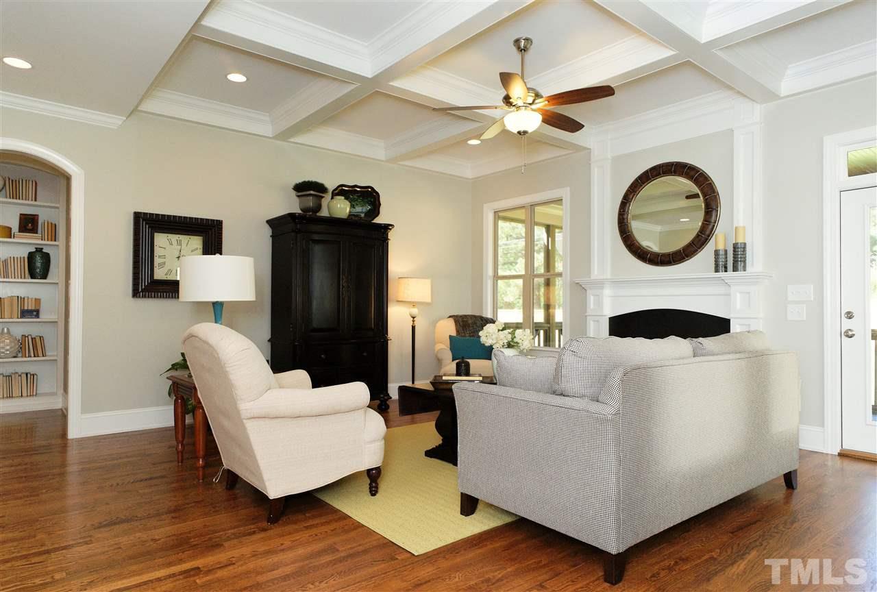 2804 Romealia Lane Raleigh, NC 27613 - Photo 10 of 25 a living room with furniture and a table