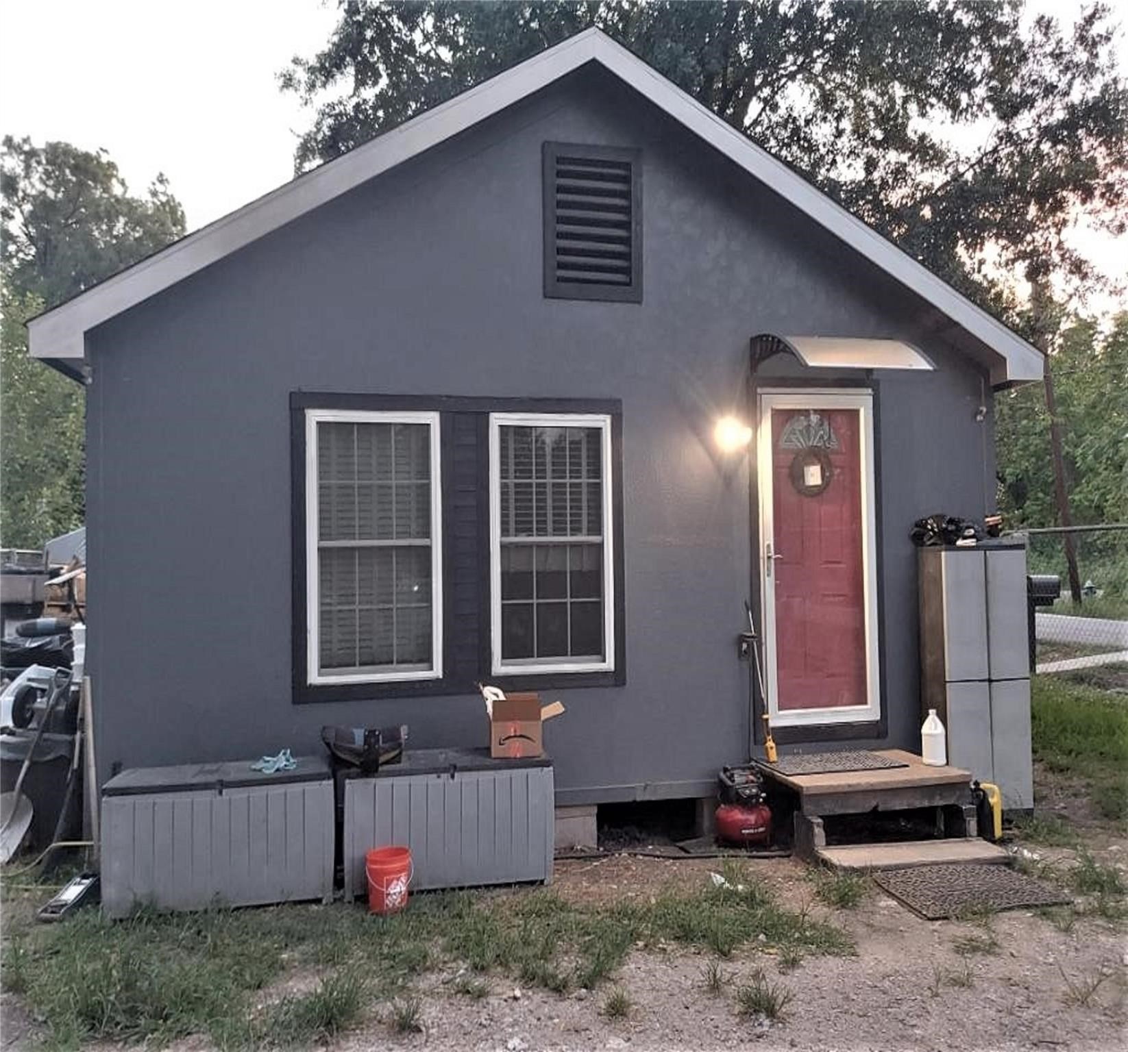 4802 Ward Street Houston, TX 77021 - Photo 13 of 16 a front view of a house with a yard