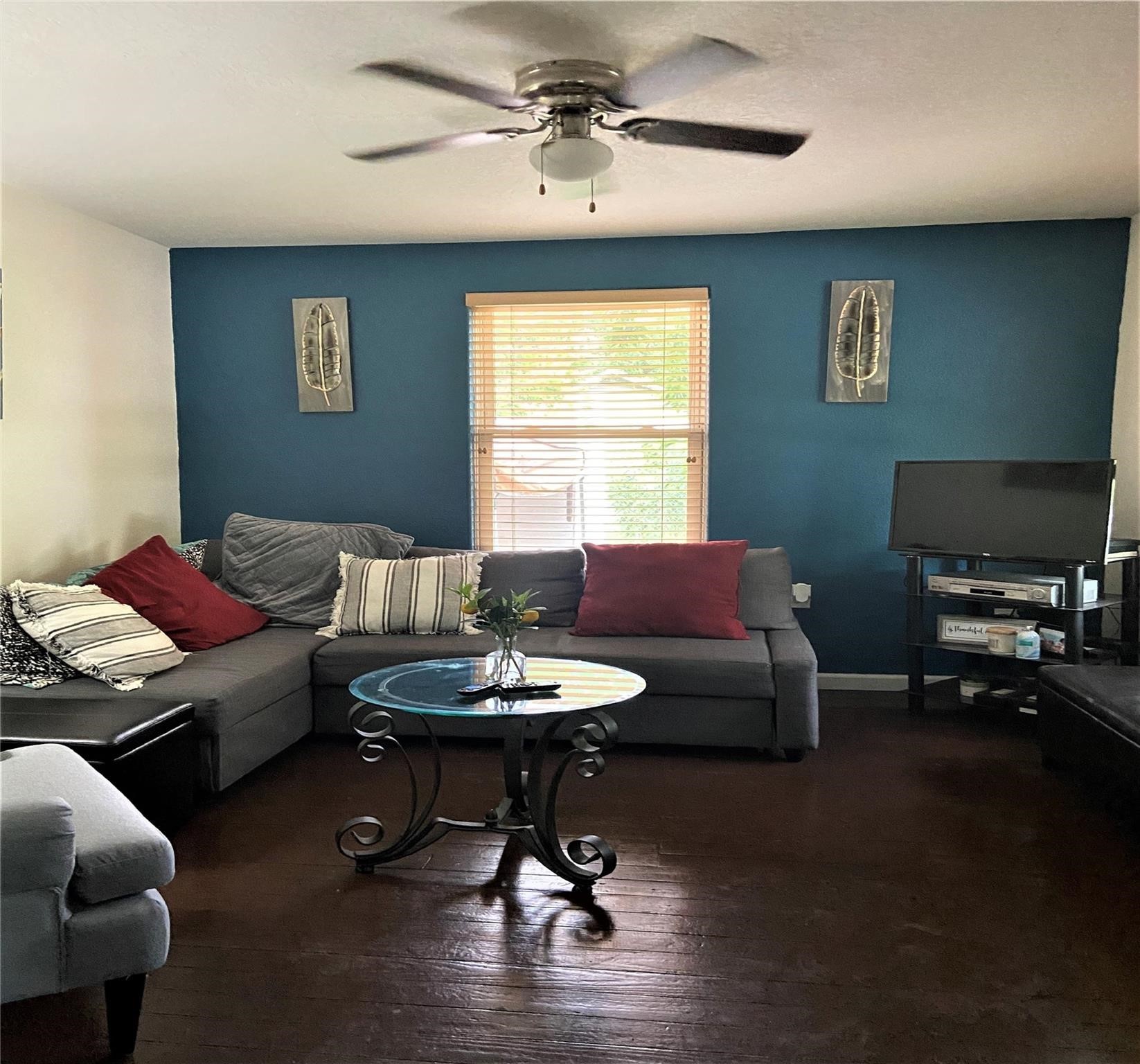 4802 Ward Street Houston, TX 77021 - Photo 2 of 16 a living room with furniture and a window