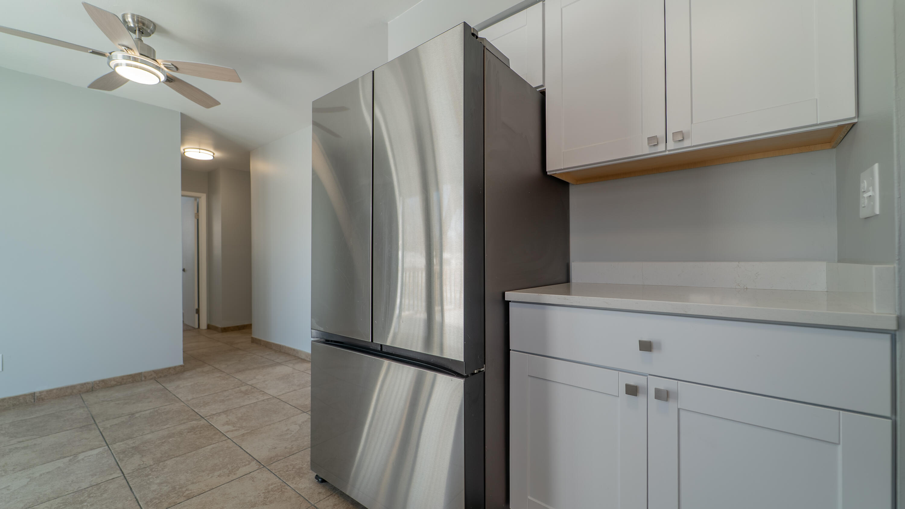 9380 Mckinley Street Crown Point, IN 46307 - Photo 15 of 41 a view of cabinets with refrigerator and cabinet
