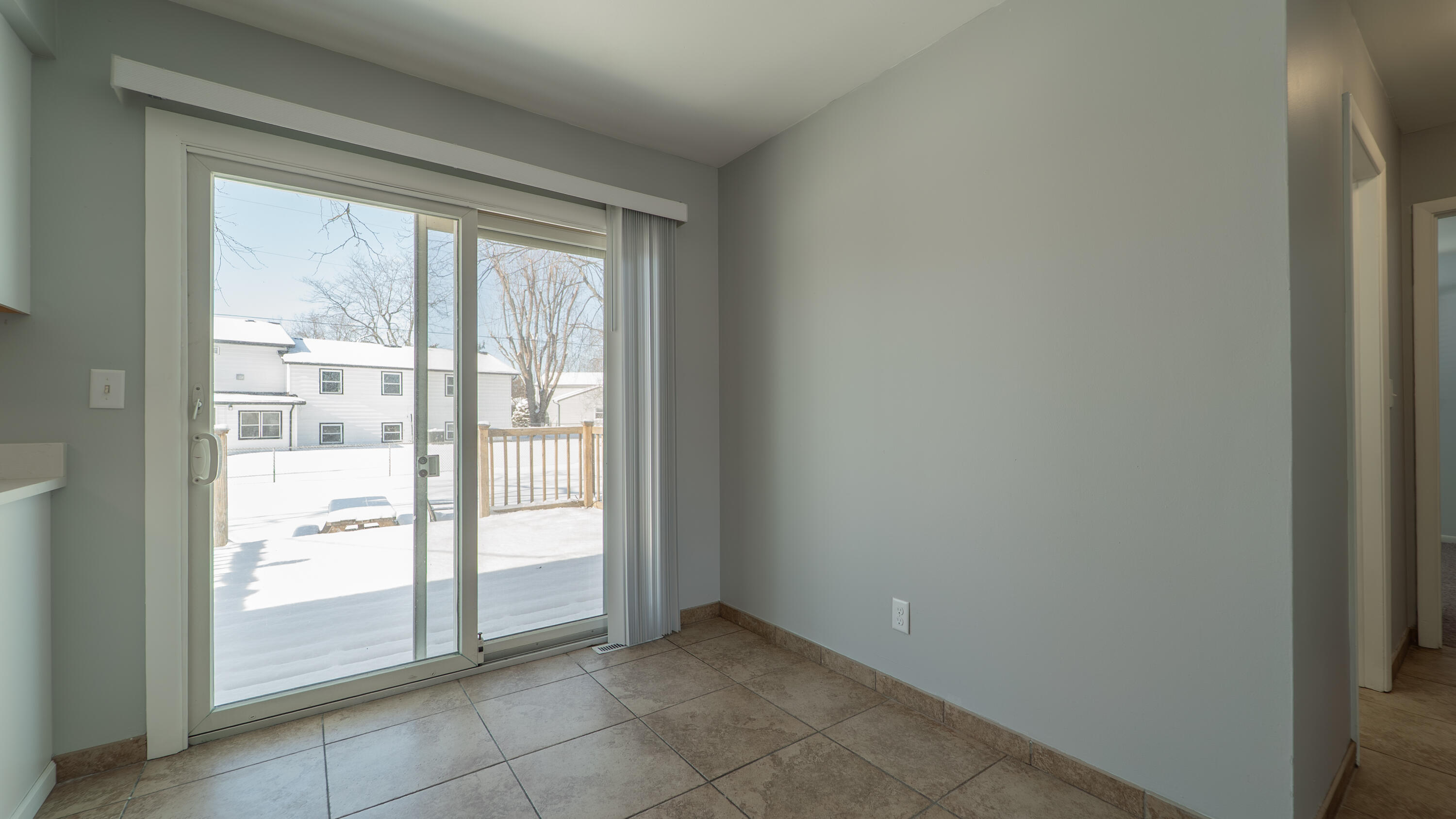 9380 Mckinley Street Crown Point, IN 46307 - Photo 17 of 41 a view of an empty room with bathroom and a window
