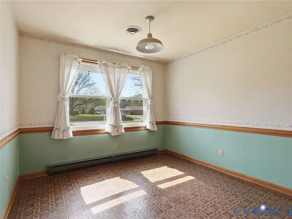 a room with window and a ceiling fan