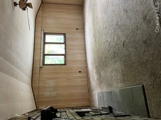 100 Decker Road, Unit 2 Wallkill, NY 12589 - Photo 16 of 23 an empty room with windows