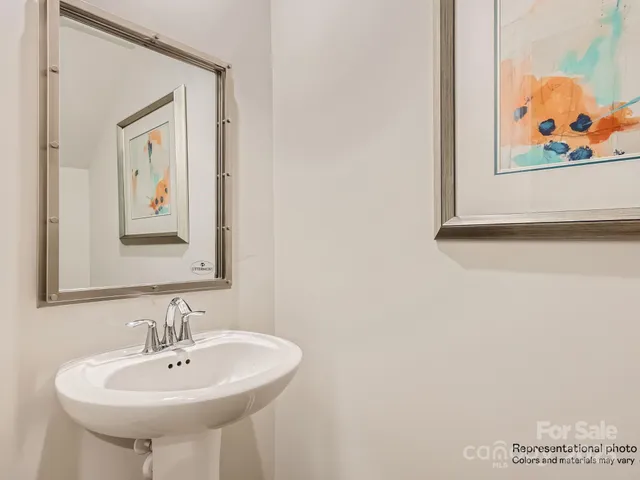 a spacious bedroom with a bed and window