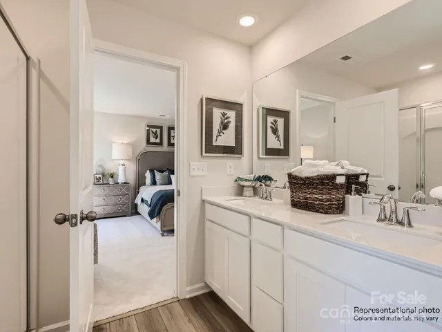 a bathroom with sink and mirror