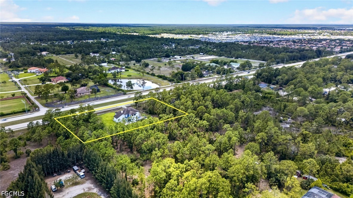 2665 Oil Well Road Naples, FL 34120 - Photo 39 of 40 an aerial view of multiple house