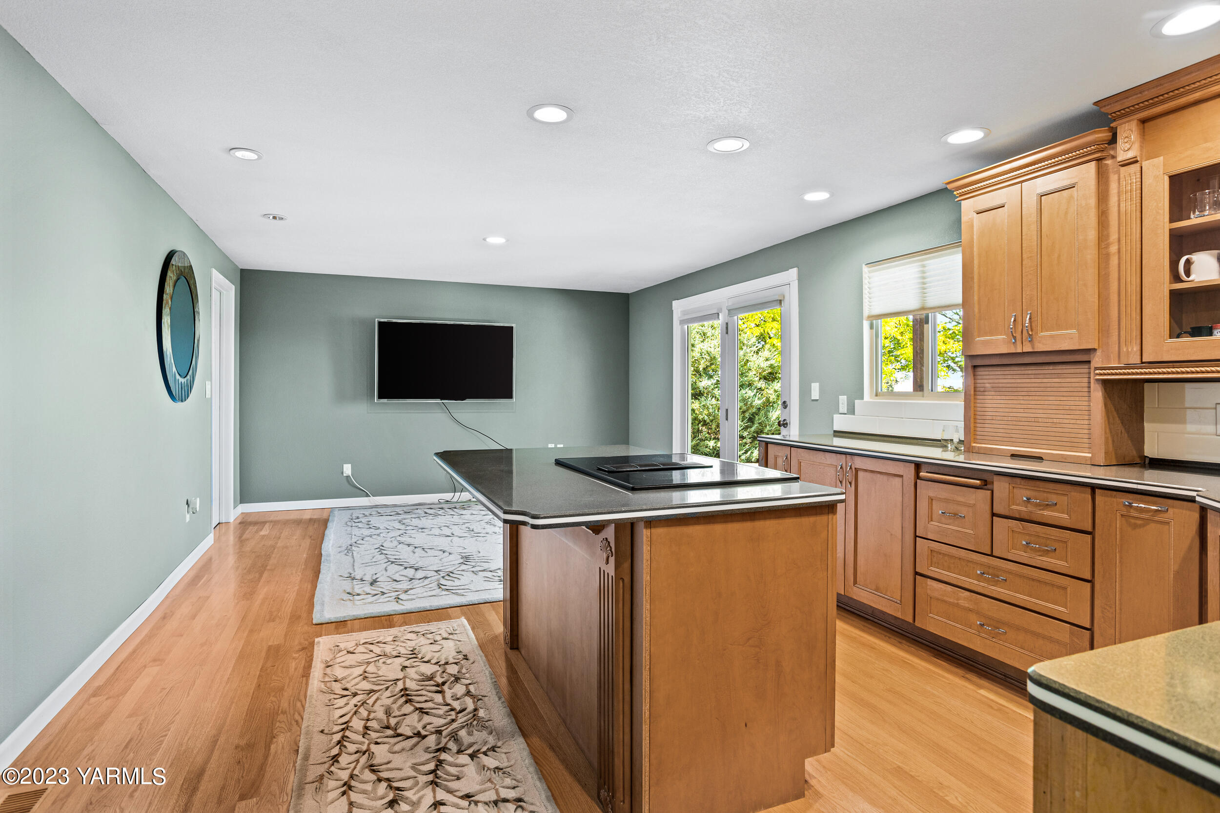 13518 Fisk Road Yakima, WA 98908 - Photo 13 of 58 a kitchen with stainless steel appliances granite countertop a stove a sink and a microwave