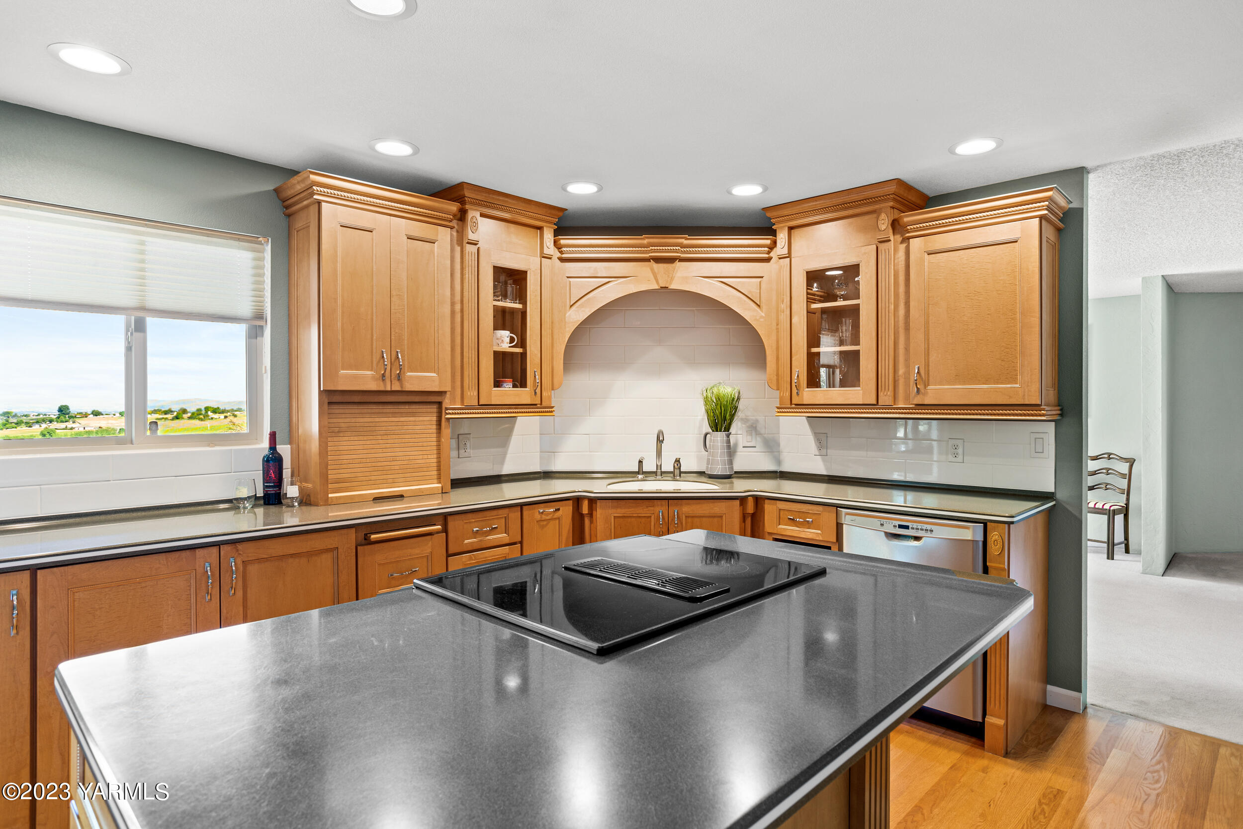 13518 Fisk Road Yakima, WA 98908 - Photo 16 of 58 a kitchen with stainless steel appliances a sink and a stove top oven