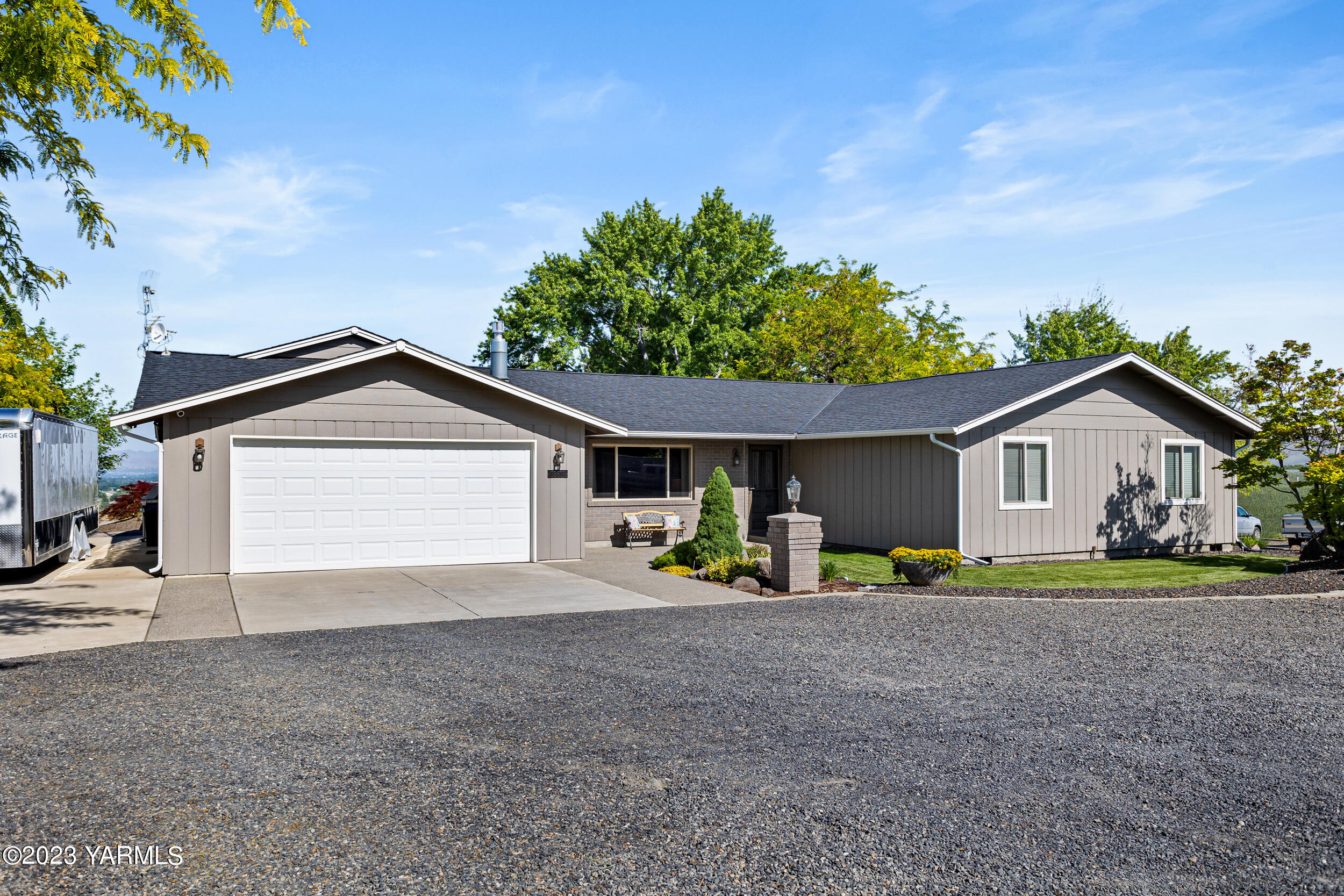 13518 Fisk Road Yakima, WA 98908 - Photo 3 of 58 a view of a house with a outdoor space