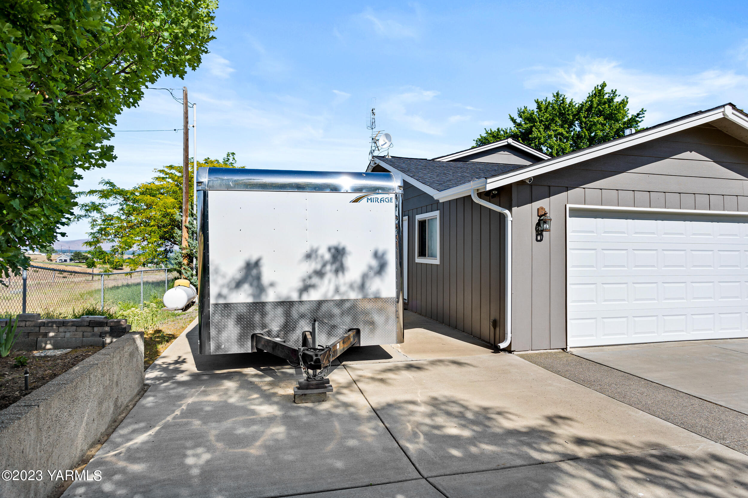 13518 Fisk Road Yakima, WA 98908 - Photo 32 of 58 a view of a house with a patio