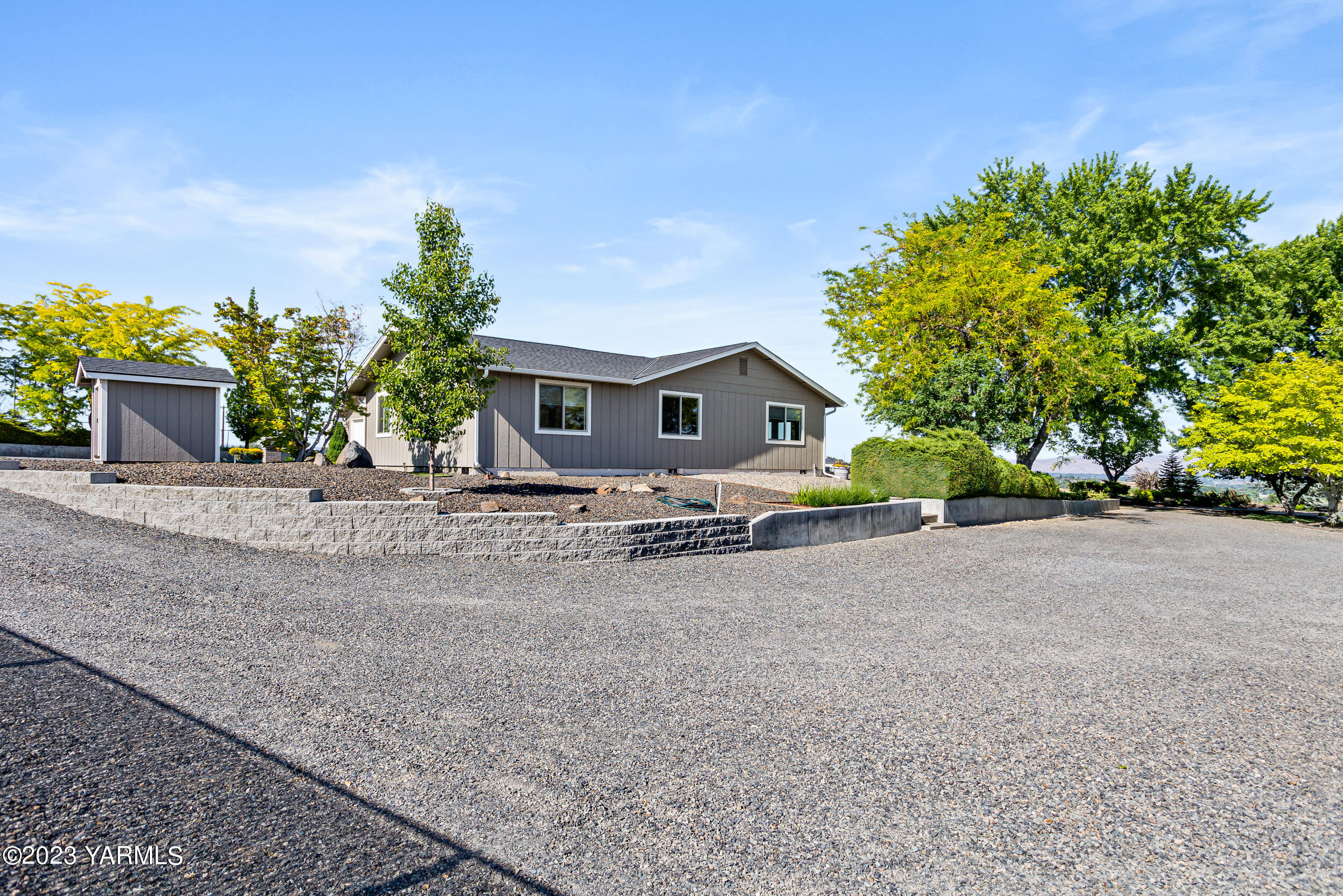 13518 Fisk Road Yakima, WA 98908 - Photo 34 of 58 a view of house with outdoor space and garden