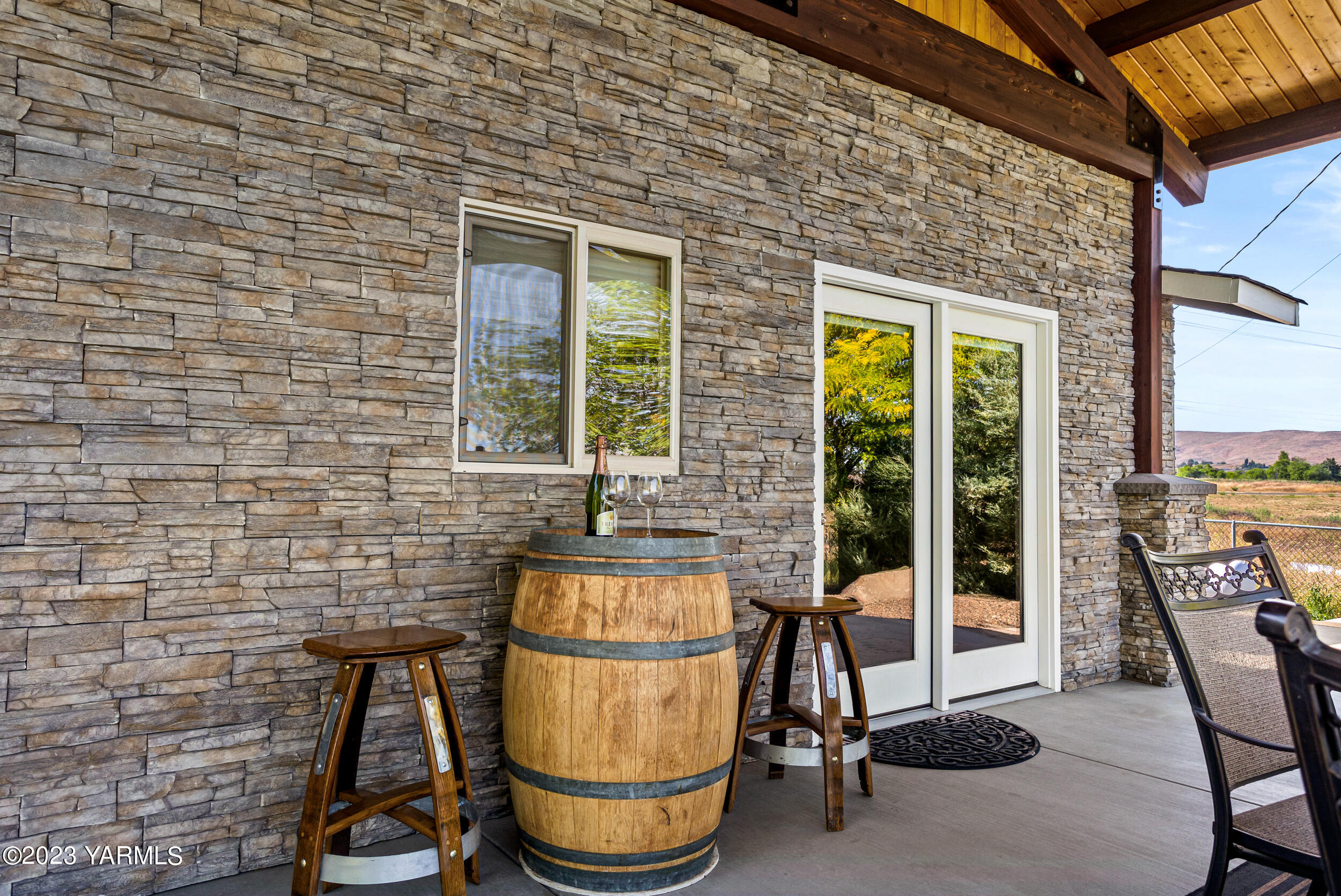 13518 Fisk Road Yakima, WA 98908 - Photo 44 of 58 a view of a chair and table in the balcony