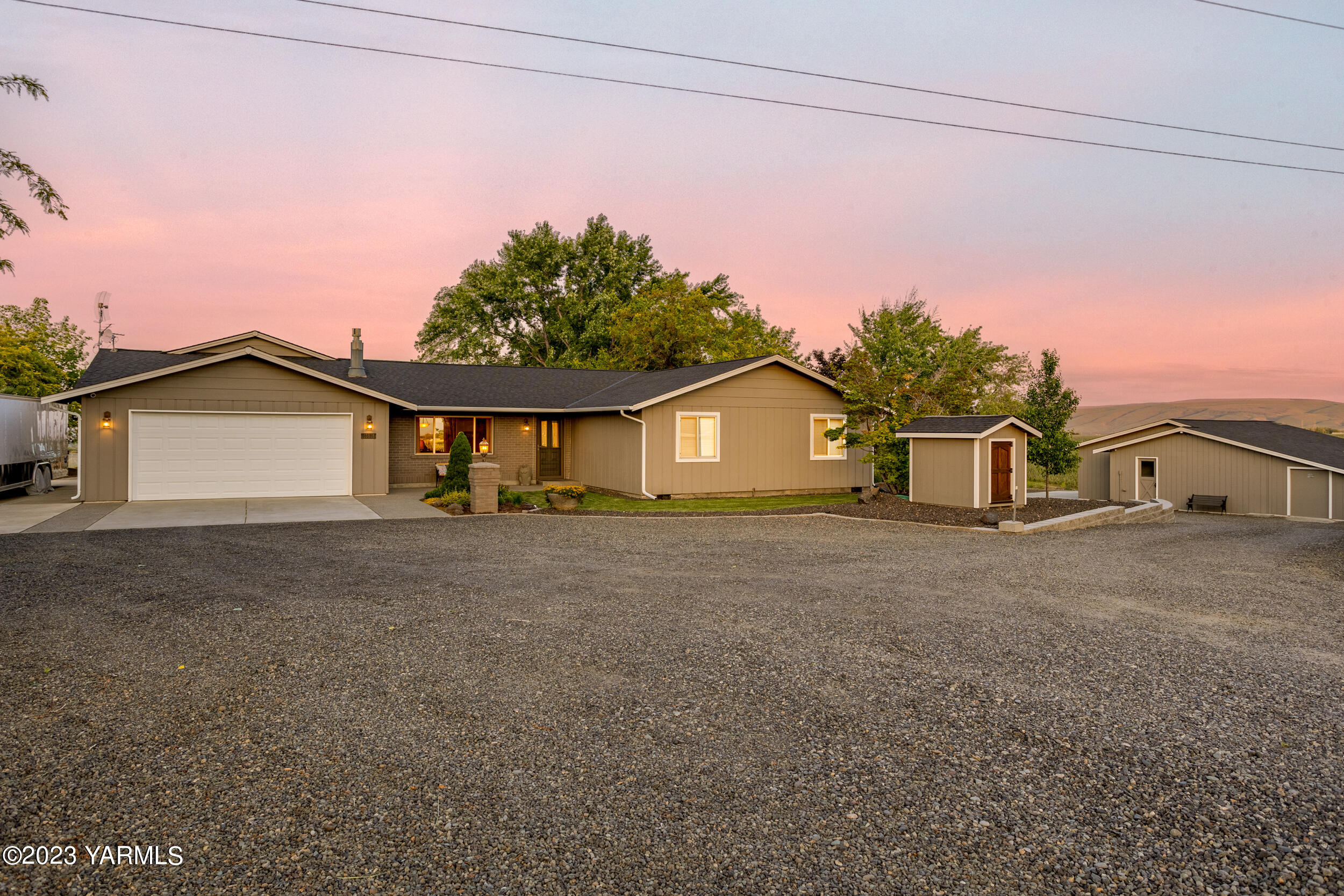 13518 Fisk Road Yakima, WA 98908 - Photo 54 of 58 a view of a house with a yard and garage