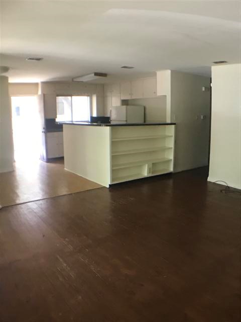 917 Keith Lane, Unit B Austin, TX 78705 - Photo 10 of 11 a view of a kitchen with a sink and dishwasher