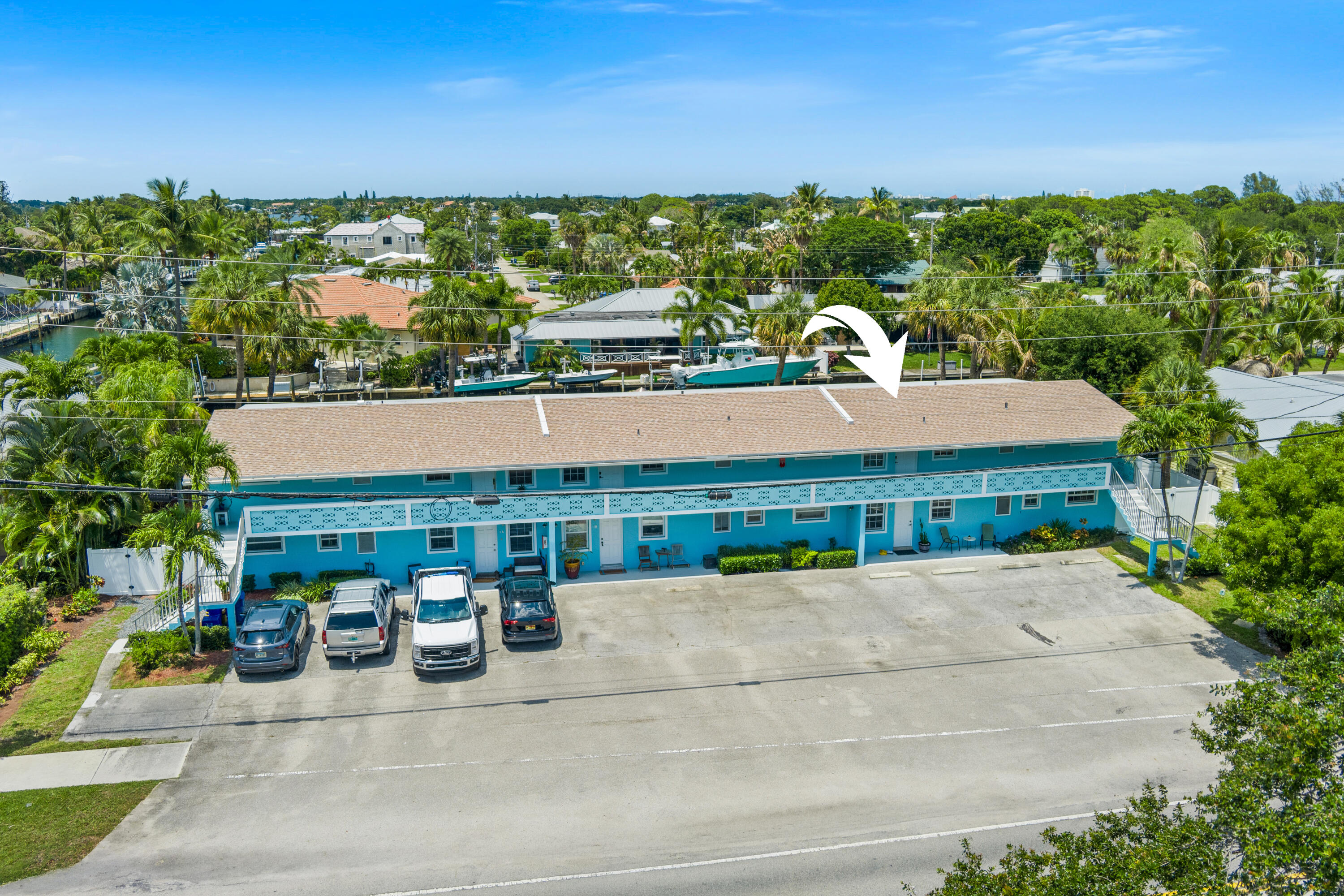 249 Center Street, Unit 2C Jupiter, FL 33458 - Photo 29 of 29 a view of a street with houses