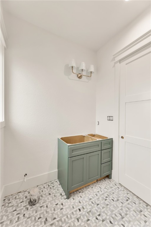 1141 Bluebonnet Ridge Drive Chappell Hill, TX 77426 - Photo 17 of 32 a room with cabinets and dust bin