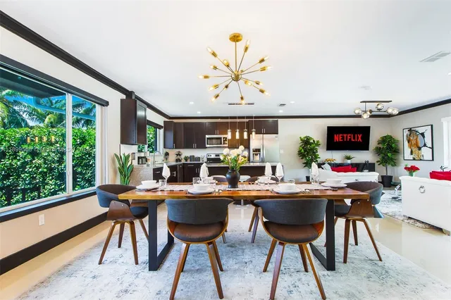 a room with furniture and a large window