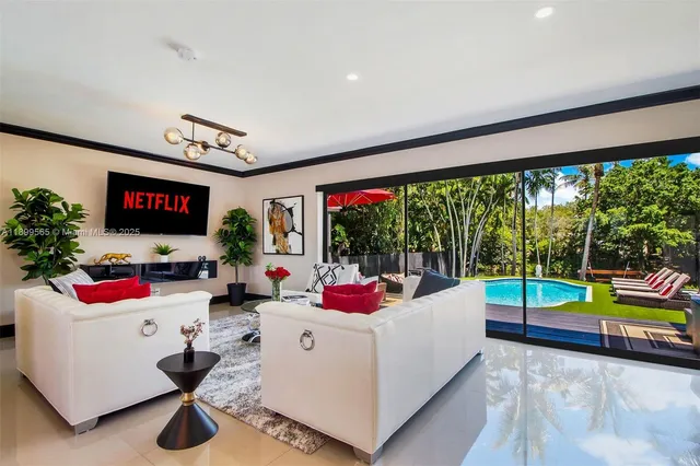 a bathroom with a sink mirror and toilet