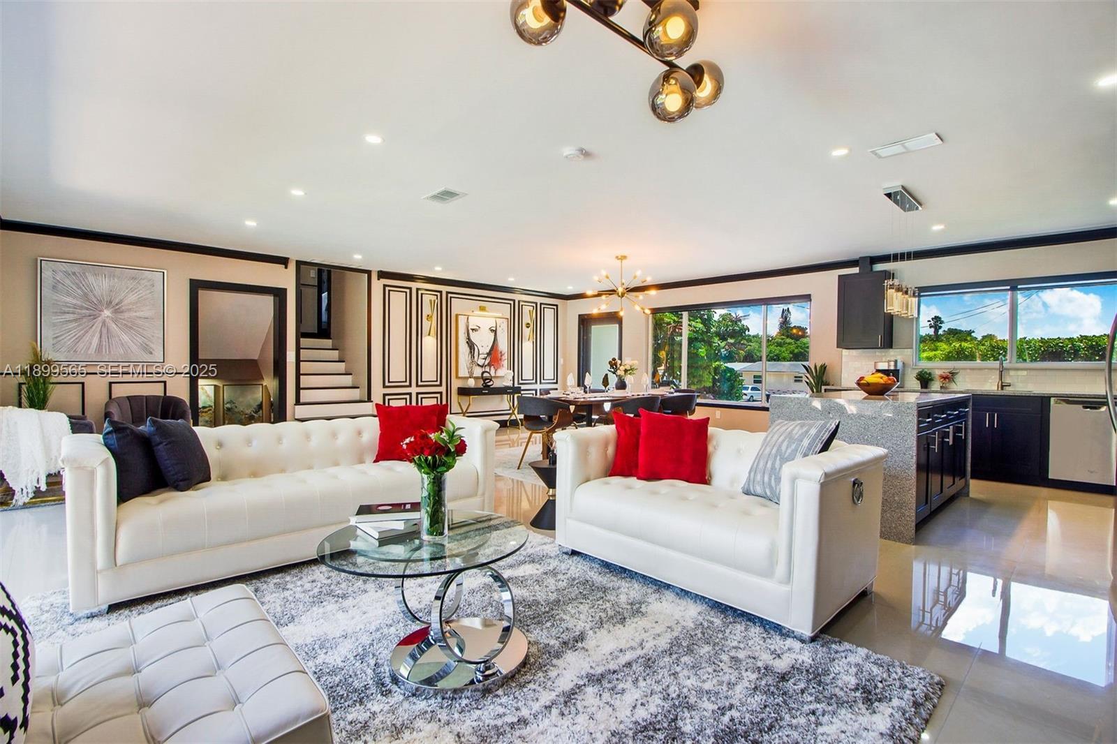 11975 West Biscayne Canal Road Miami, FL 33161 - Photo 37 of 58 a living room with furniture and a flat screen tv