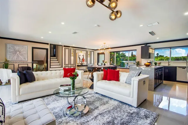 a bedroom with a bed and a potted plant