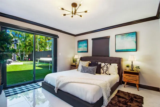 a view of a backyard with sitting area