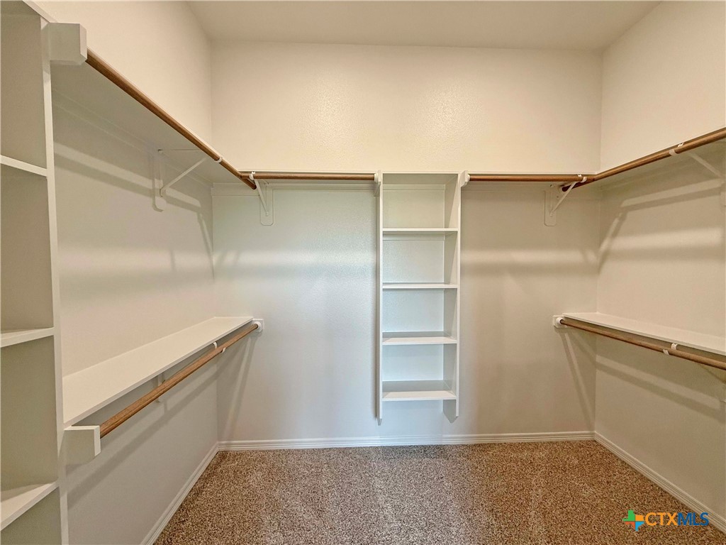 203 Lasso Loop Lorena, TX 76655 - Photo 17 of 24 a view of an empty walk in closet