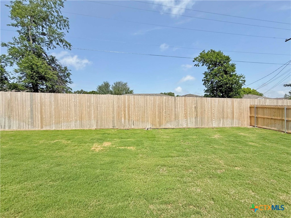 203 Lasso Loop Lorena, TX 76655 - Photo 22 of 24 a view of outdoor space with deck and yard