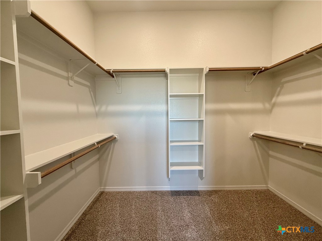 203 Lasso Loop Lorena, TX 76655 - Photo 28 of 36 a view of an empty walk in closet