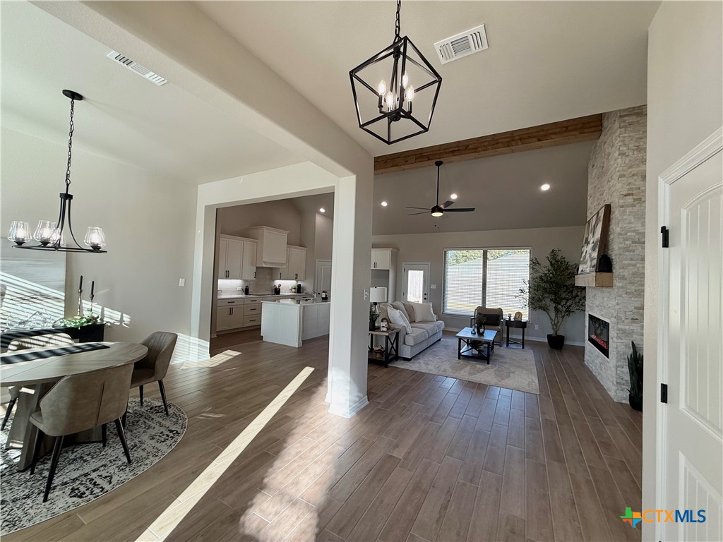 203 Lasso Loop Lorena, TX 76655 - Photo 3 of 36 a view of a livingroom with furniture and a chandelier