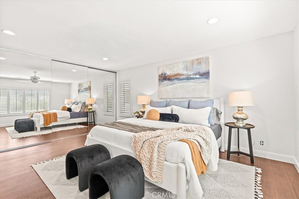 3 Christamon South Irvine, CA 92620 - Photo 17 of 40 a bedroom with a bed and wooden floor