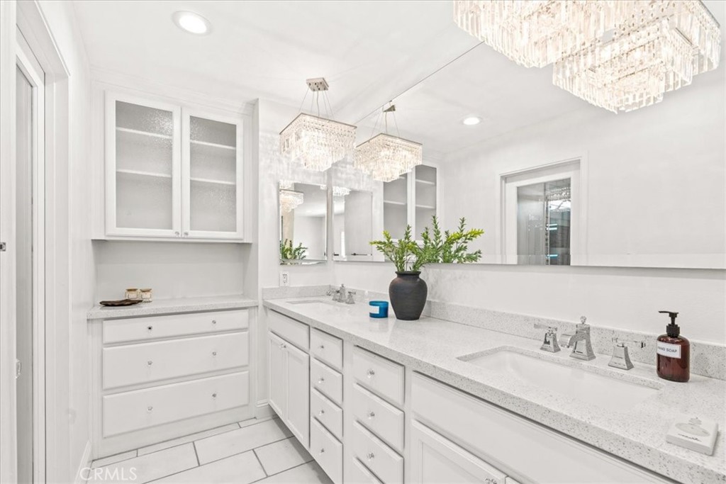 3 Christamon South Irvine, CA 92620 - Photo 19 of 40 a bathroom with a sink and a mirror