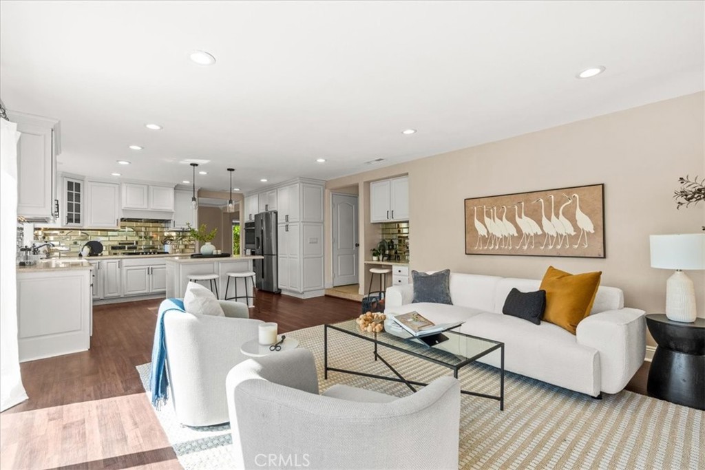 3 Christamon South Irvine, CA 92620 - Photo 5 of 40 a living room with furniture and kitchen view