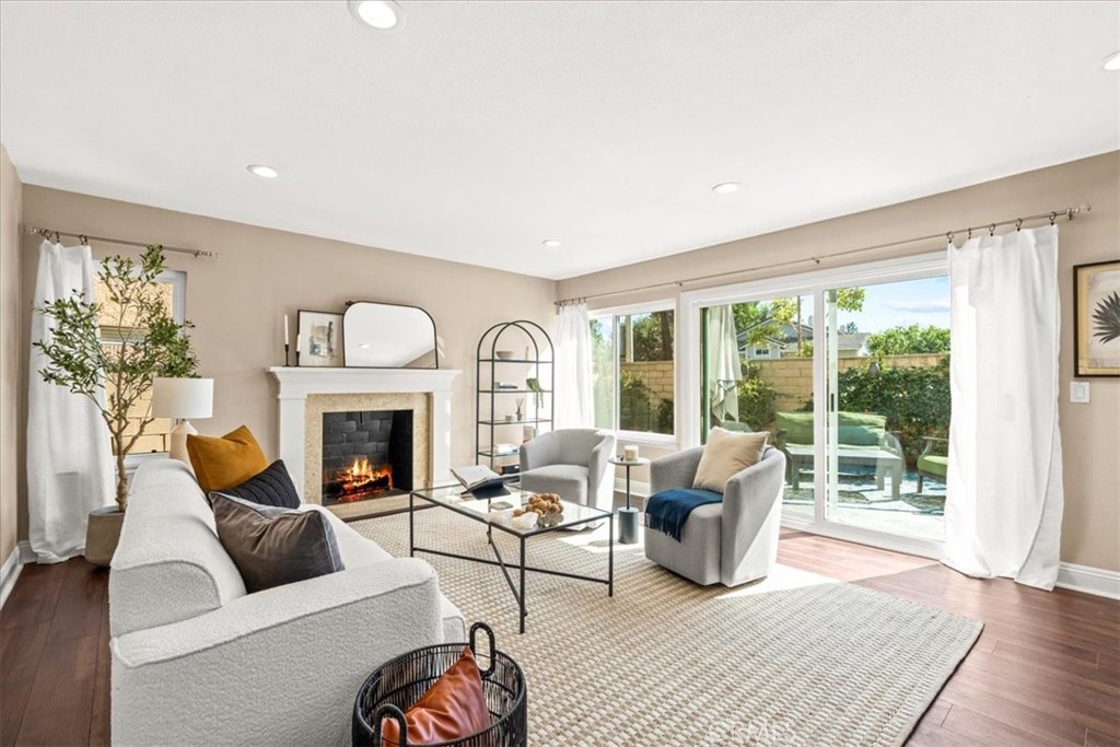 3 Christamon South Irvine, CA 92620 - Photo 7 of 40 a living room with furniture and a fireplace