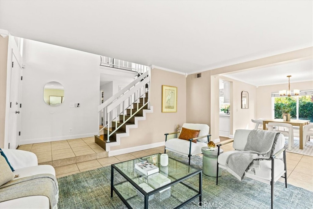 3 Christamon South Irvine, CA 92620 - Photo 10 of 40 a living room with furniture and a dining table